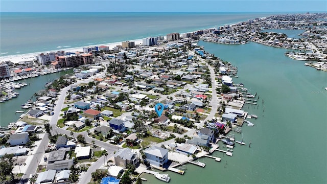 birds eye view of property with a view of city and a water view