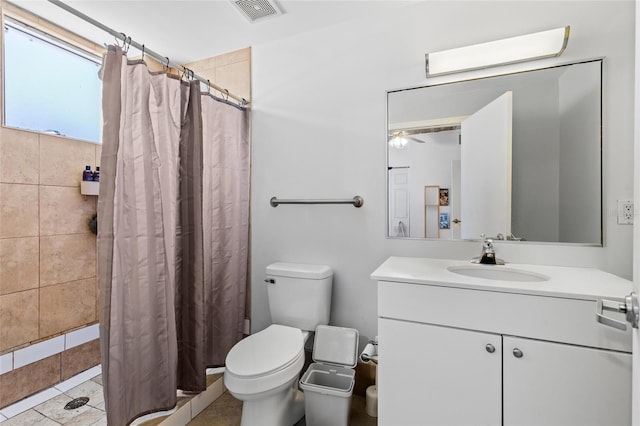 2515 SW 35th Pl Unit 203, Gainesville, FL 32608 - full bath featuring vanity, tiled shower, and a ceiling fan