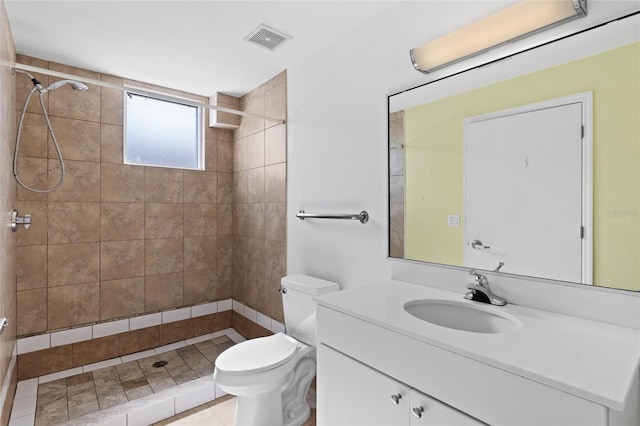 2515 SW 35th Pl Unit 203, Gainesville, FL 32608 - bathroom featuring vanity and a tile shower