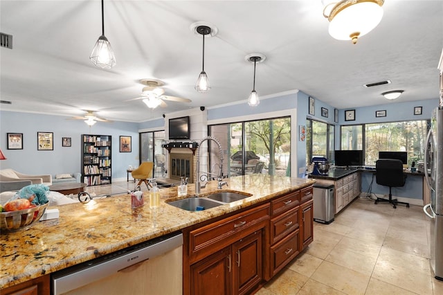 4714 NW 19th Pl, Gainesville, FL 32605 - kitchen with visible vents, a sink, appliances with stainless steel finishes, and open floor plan