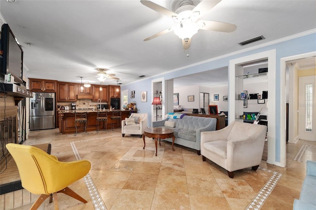 4714 NW 19th Pl, Gainesville, FL 32605 - living room with crown molding, ceiling fan, and visible vents