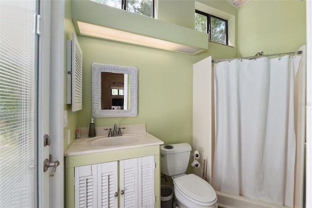 4714 NW 19th Pl, Gainesville, FL 32605 - bathroom with vanity, curtained shower, and toilet