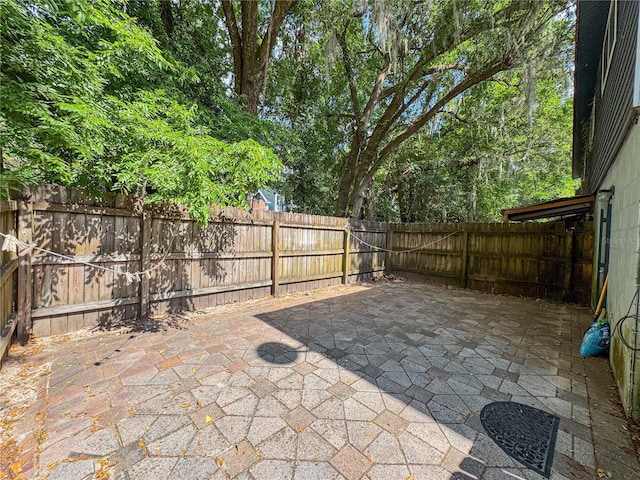 3935 SW 26th Ter Unit 3935A, Gainesville, FL 32608 - view of patio / terrace featuring a fenced backyard