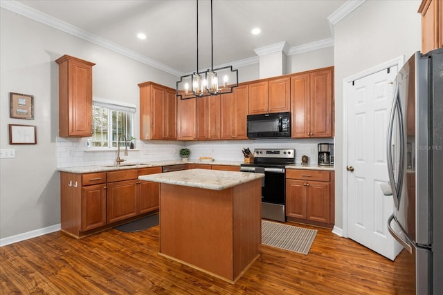 2184 NW 144th St, Newberry, FL 32669 - kitchen featuring decorative backsplash, a sink, appliances with stainless steel finishes, and dark wood finished floors