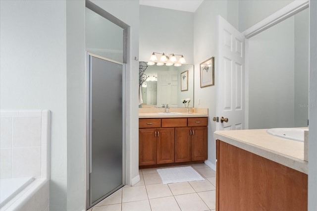 2184 NW 144th St, Newberry, FL 32669 - bathroom featuring a shower stall, vanity, a bathtub, baseboards, and tile patterned flooring