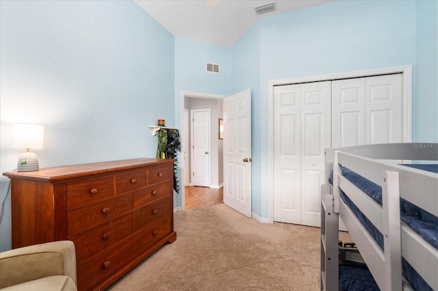 2184 NW 144th St, Newberry, FL 32669 - bedroom featuring high vaulted ceiling, a closet, visible vents, and light colored carpet