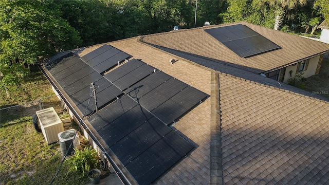 details featuring a shingled roof