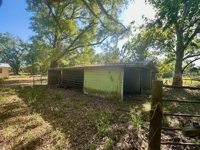 3530 NW County Road 236, Bell, FL 32619 - view of outdoor structure featuring an outbuilding and fence