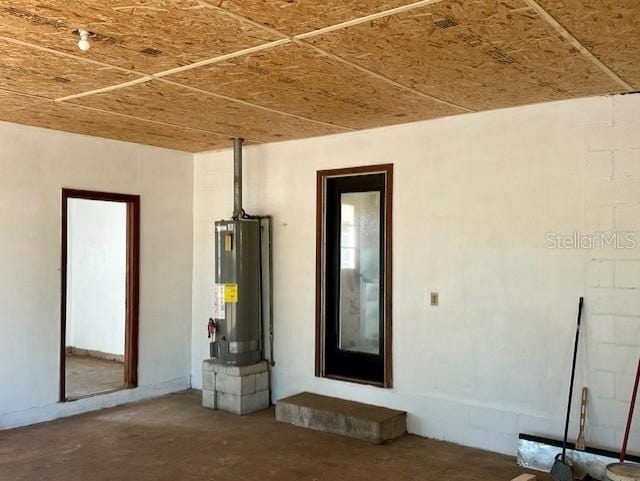 3530 NW County Road 236, Bell, FL 32619 - exterior space featuring electric water heater and stucco siding