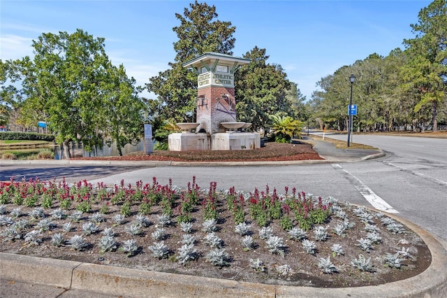 view of community sign