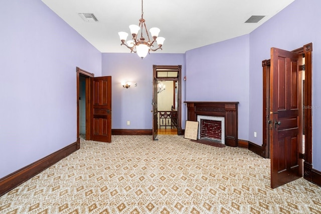 living room with a notable chandelier, baseboards, and visible vents