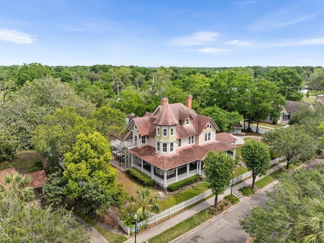 aerial view featuring a view of trees