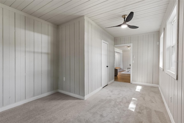 interior space with ceiling fan