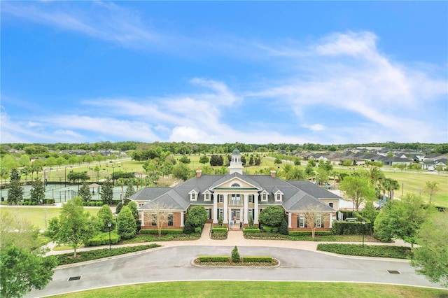 exterior space featuring curved driveway