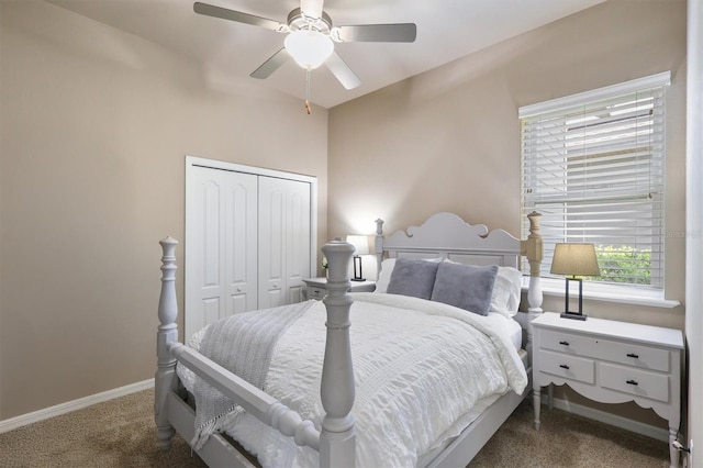 carpeted bedroom featuring a closet, a ceiling fan, and baseboards