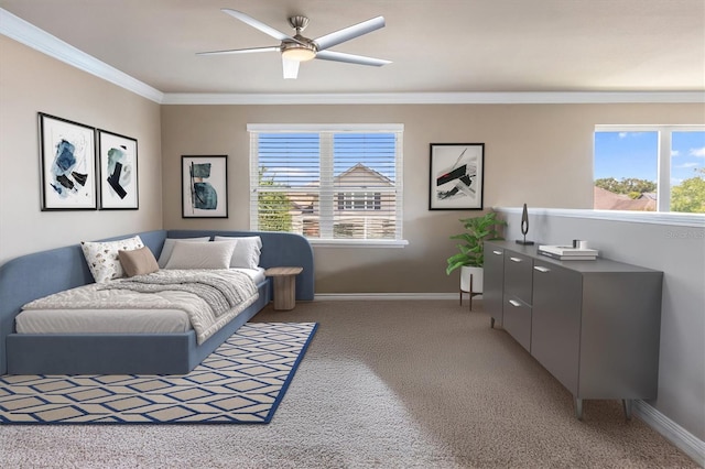 bedroom featuring crown molding, baseboards, multiple windows, and light colored carpet