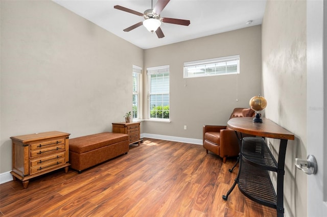 3624 SW 73rd Way, Gainesville, FL 32608 - sitting room featuring wood finished floors, a ceiling fan, and baseboards