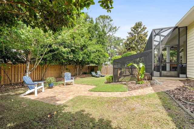 3624 SW 73rd Way, Gainesville, FL 32608 - view of yard with a patio, glass enclosure, and ceiling fan