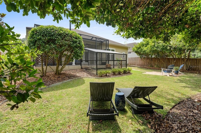 3624 SW 73rd Way, Gainesville, FL 32608 - view of yard with a patio and glass enclosure