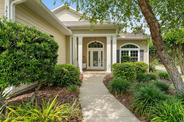 3624 SW 73rd Way, Gainesville, FL 32608 - property entrance with covered porch and a shingled roof