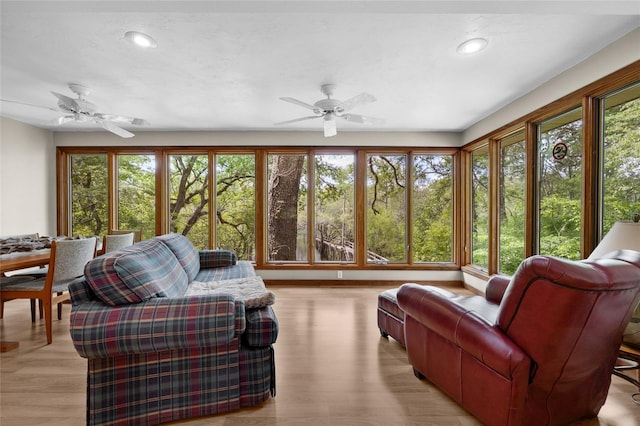 sunroom / solarium with recessed lighting