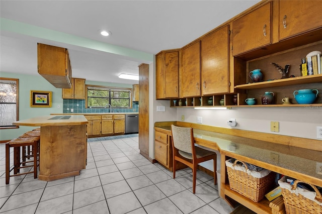 kitchen with light countertops, brown cabinets, open shelves, dishwasher, and light tile patterned floors