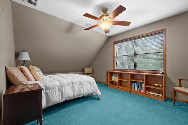 carpeted bedroom featuring vaulted ceiling, visible vents, and a ceiling fan
