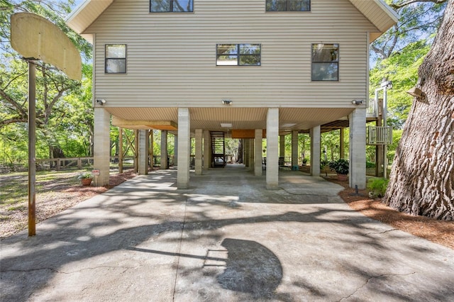 exterior space featuring a carport and driveway
