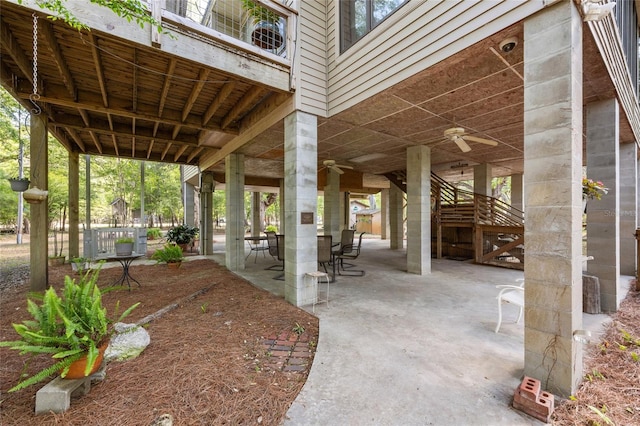 view of community with a patio area and outdoor dining space