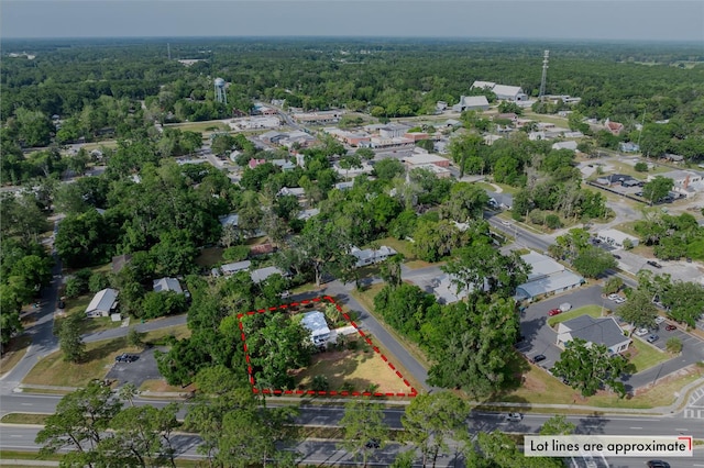 aerial view with a forest view and a residential view
