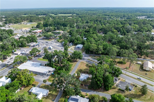 drone / aerial view with a view of trees