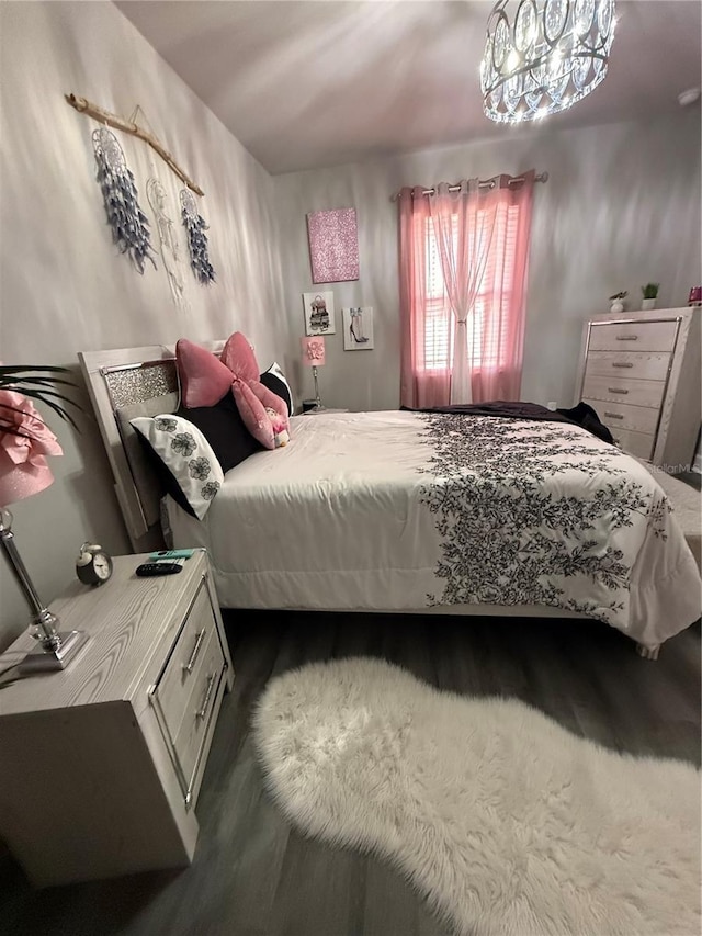 bedroom featuring wood finished floors