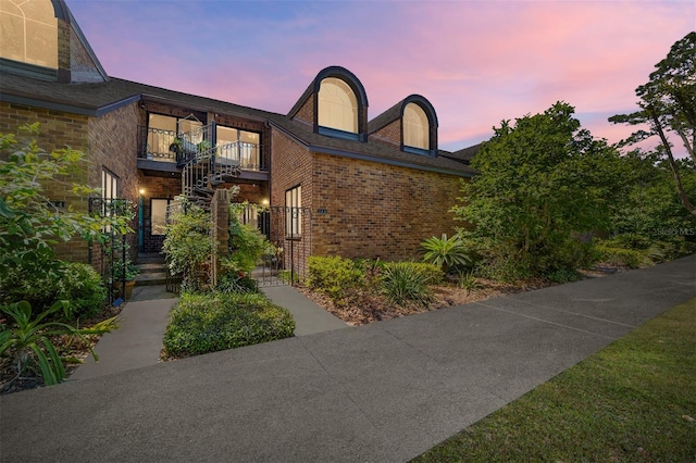 706 NE 1st St Unit 706, Gainesville, FL 32601 - townhome / multi-family property featuring a balcony and brick siding