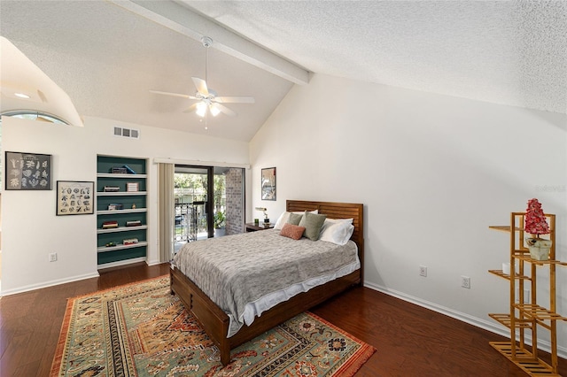 706 NE 1st St Unit 706, Gainesville, FL 32601 - bedroom with baseboards, visible vents, vaulted ceiling with beams, and a textured ceiling