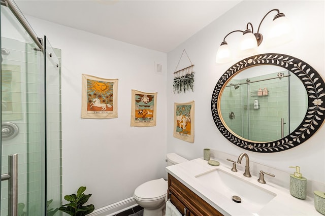 706 NE 1st St Unit 706, Gainesville, FL 32601 - bathroom with vanity, visible vents, toilet, and a stall shower