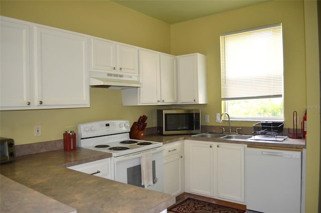 3870 SW 20th Ave Unit 1607, Gainesville, FL 32607 - kitchen featuring white cabinets, under cabinet range hood, white appliances, and a sink