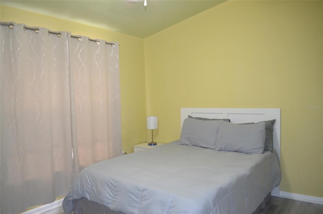 3870 SW 20th Ave Unit 1607, Gainesville, FL 32607 - bedroom with wood finished floors and baseboards