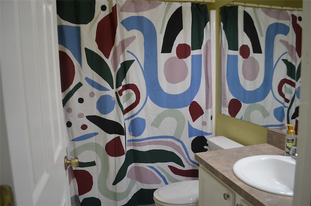 3870 SW 20th Ave Unit 1607, Gainesville, FL 32607 - full bath featuring toilet, vanity, and a shower with curtain