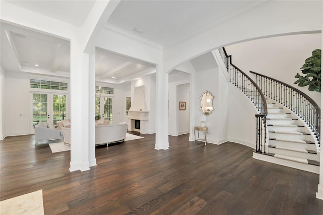 14819 NW 21st Ave, Newberry, FL 32669 - interior space featuring arched walkways, stairs, french doors, and dark wood-type flooring