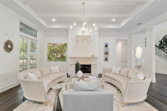 14819 NW 21st Ave, Newberry, FL 32669 - living area featuring a notable chandelier, beamed ceiling, a premium fireplace, stairway, and dark wood-type flooring