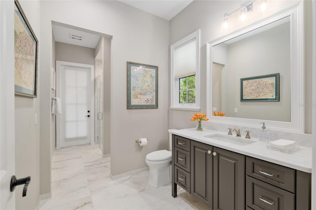14819 NW 21st Ave, Newberry, FL 32669 - bathroom featuring a shower stall, marble finish floor, toilet, vanity, and baseboards
