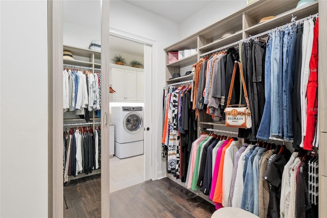 14819 NW 21st Ave, Newberry, FL 32669 - walk in closet featuring wood finished floors and independent washer and dryer