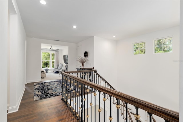 14819 NW 21st Ave, Newberry, FL 32669 - hallway with baseboards, wood finished floors, recessed lighting, and an upstairs landing
