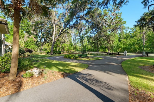 14819 NW 21st Ave, Newberry, FL 32669 - surrounding community featuring a yard and fence