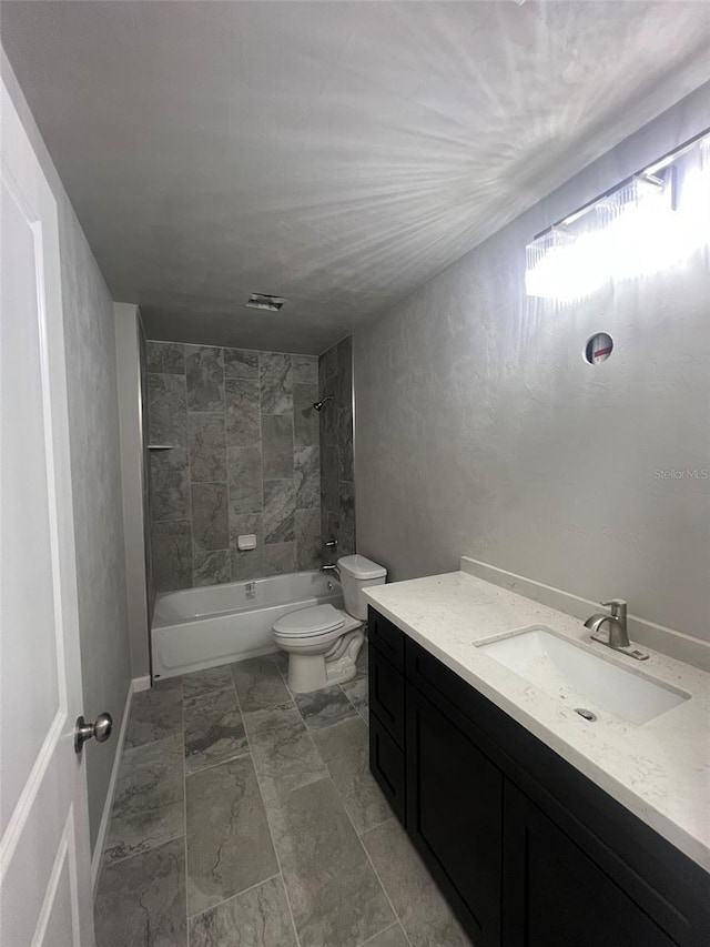 full bath featuring vanity, marble finish floor, toilet, shower / bathtub combination, and visible vents