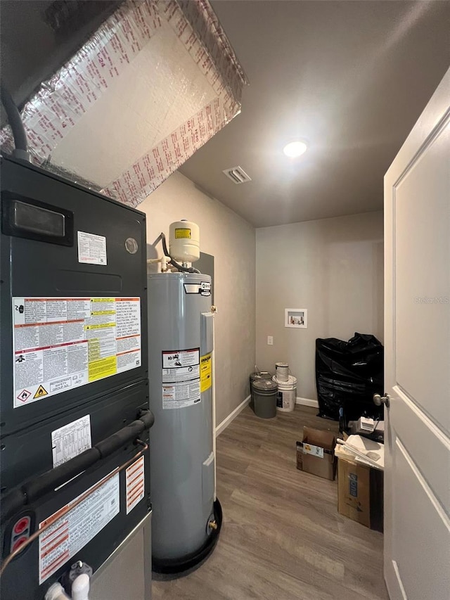 utilities with water heater and heating unit