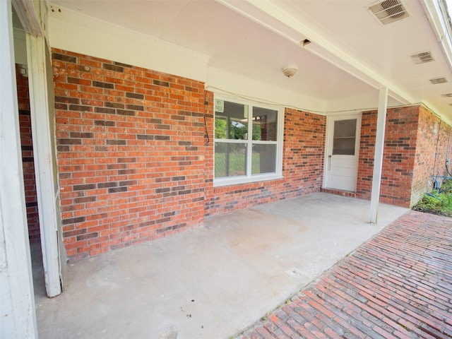 view of patio / terrace featuring visible vents
