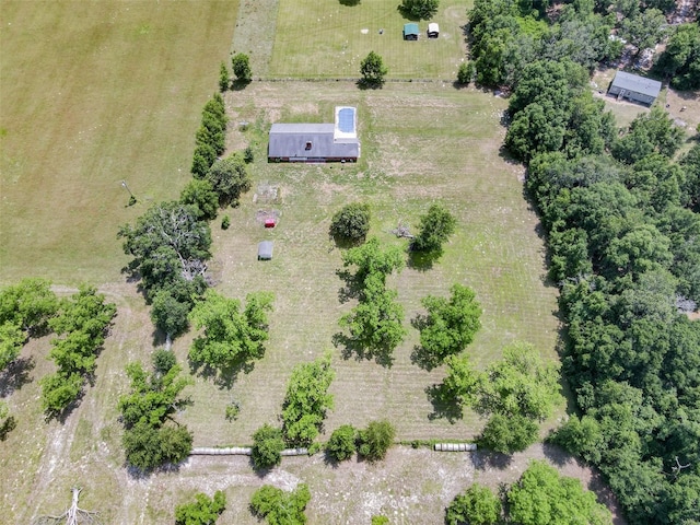 birds eye view of property with a rural view