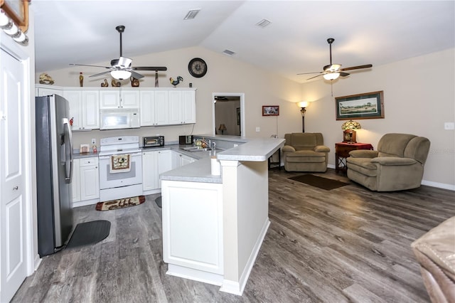 kitchen with ceiling fan, a peninsula, open floor plan, and white appliances