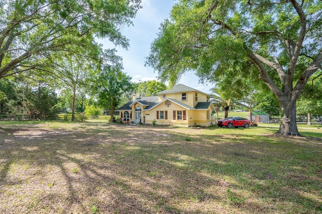 view of yard with fence